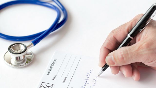 Doctor Is Writing A Prescription