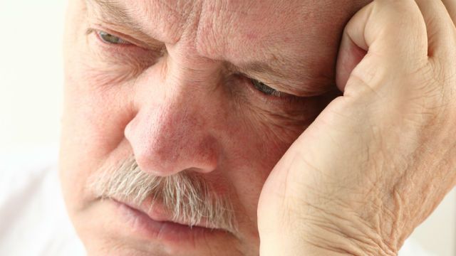 older man looking depressed
