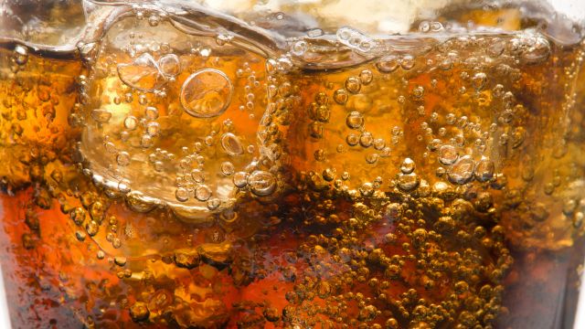 Glasses with soda and ice cubes