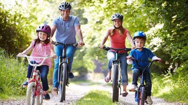 family-biking-to-stay-active