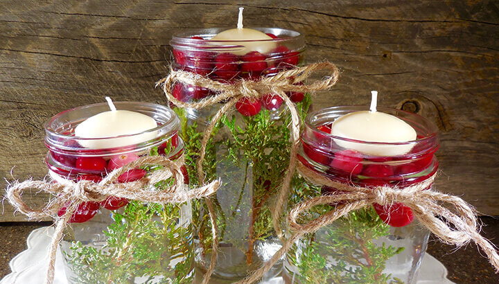 Christmas Floating Candles With Cranberries And Greenery