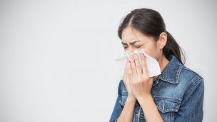 Science Says Do This First and Fast When Someone Near You Sneezes or Coughs