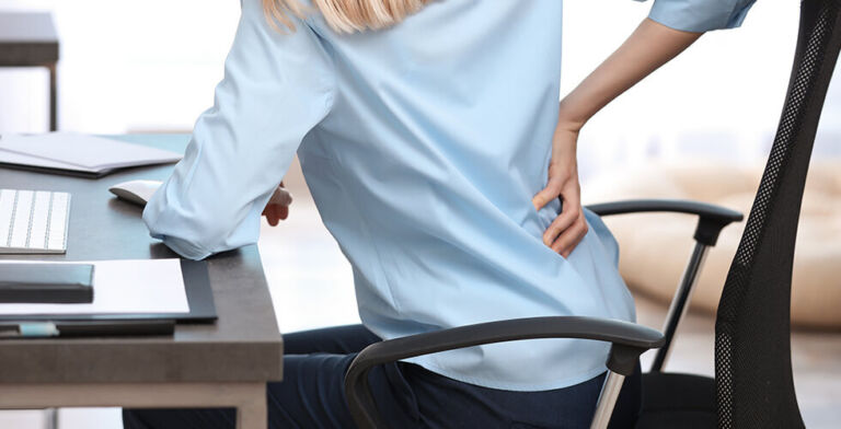 This 1-Minute Stretch Could Undo Hours of Sitting, According to a Top Trainer